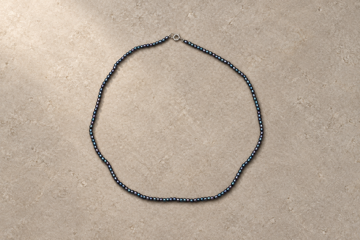 Tiny Black Pearl Necklace, in warm light