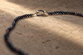 Tiny Blue and Black Pearl Necklace with silver clasp