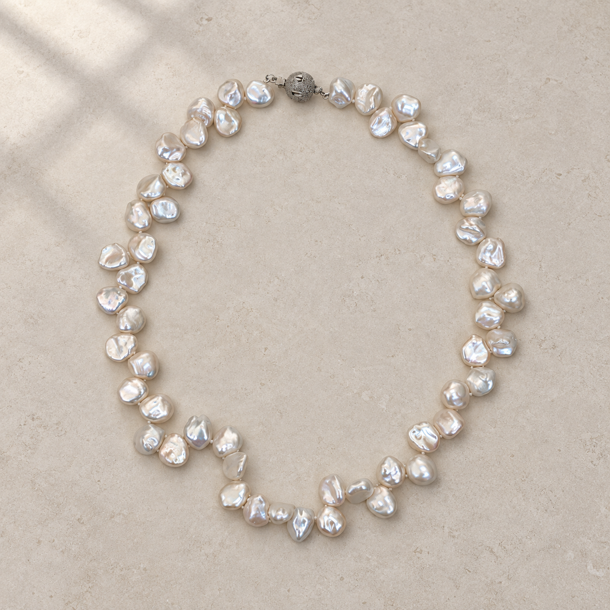 Best Seller Baroque Pearl Necklace on limestone