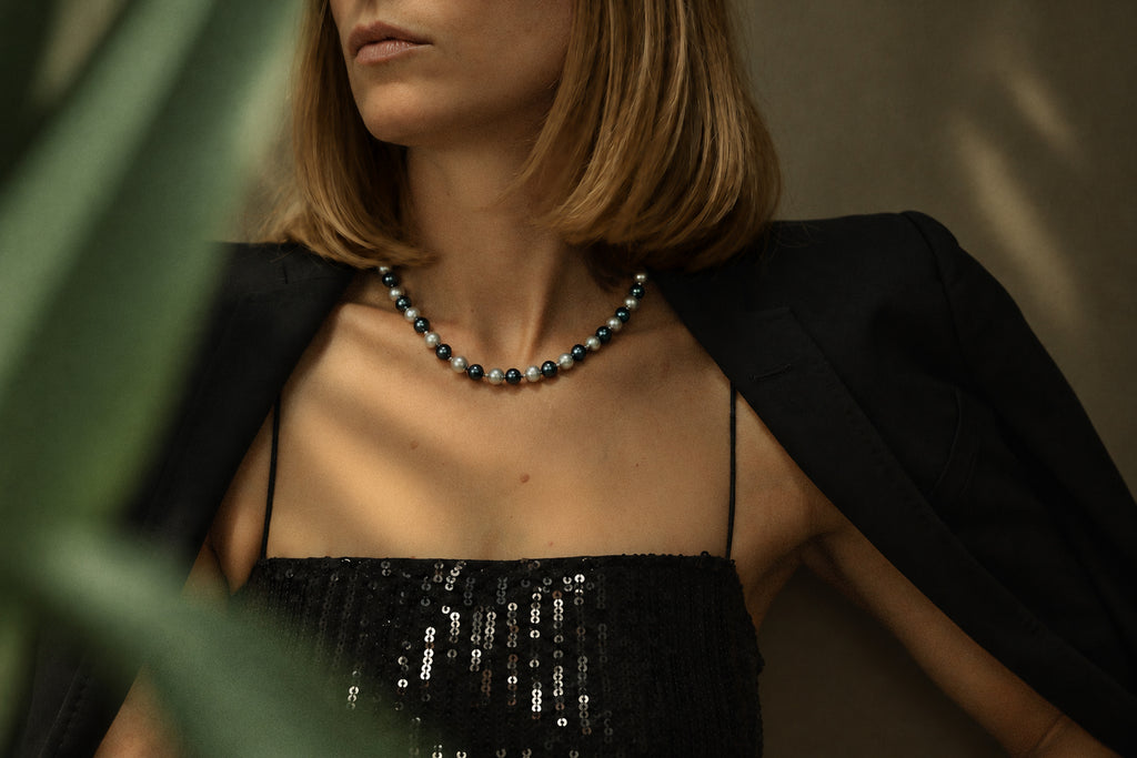 Grey Pearl Necklace with Silver Details, worn