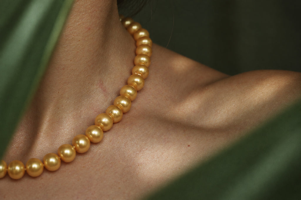 Golden Pearl Necklace, worn on the neck